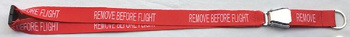 Smycz Remove Before Flight
